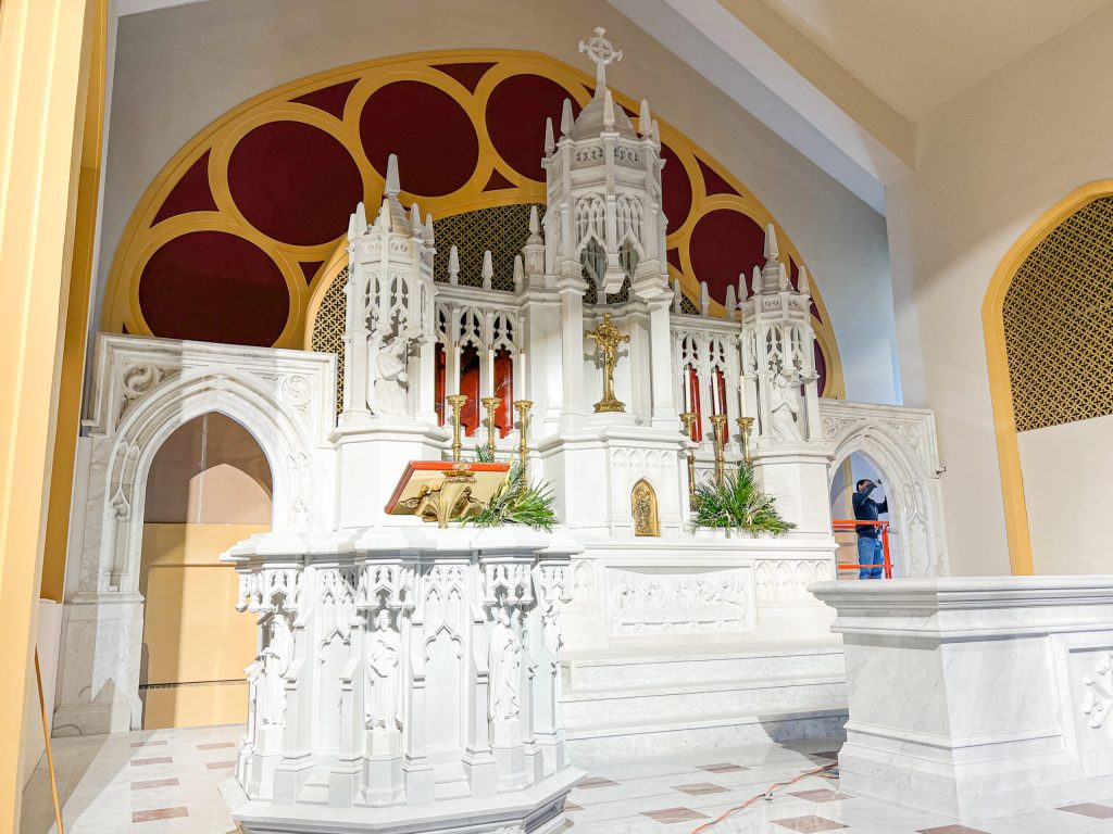 Inside Of A Church With A White Design Structure.